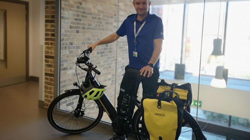 Paramedic Matt Kilner with his bike and emergency equipment at The Nelson Health Centre